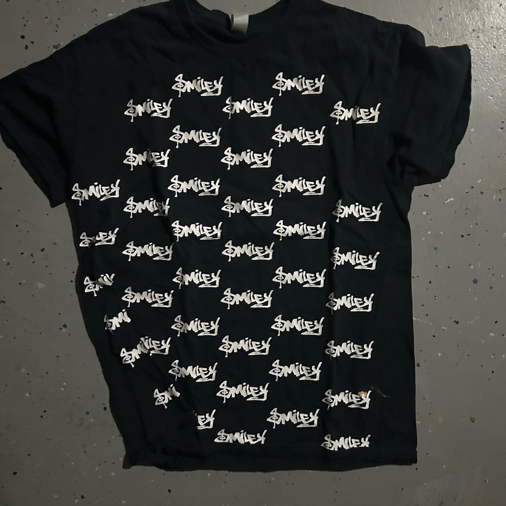 black and white smiley tower shirt